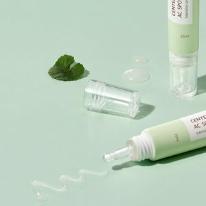 Skin TOGO iUNIK Centella Calming AC Spot Cream tubes with clear applicator tips and soothing gel texture on green