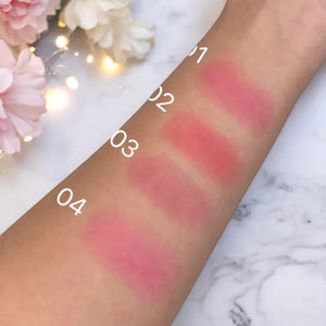 Skin TOGO Luxelux Jelly Tint Stick swatches on arm showing four shades of light pink and rose tints