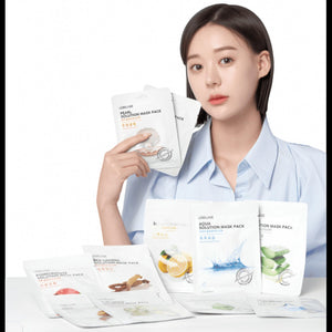 Skin TOGO model holding a Lebelage Propolis Solution sheet mask with various other skincare mask packs on a table.