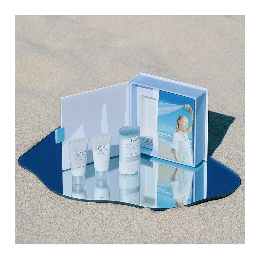 Skin TOGO Madagascar Centella Hyalu-cica Sunsational Kit featuring three travel-sized skincare products on a mirror.