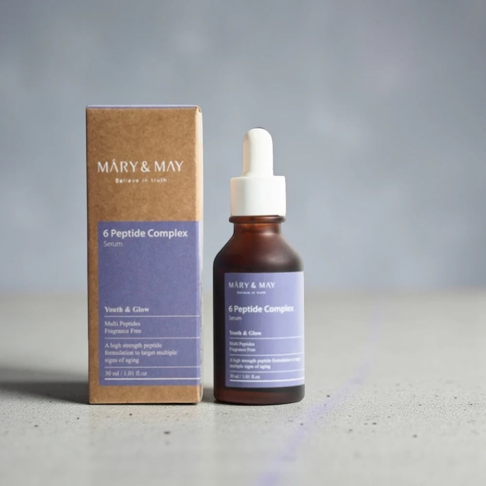 Skin TOGO Mary & May 6 Peptide Complex anti-aging serum in a brown glass dropper bottle with matching paper box.