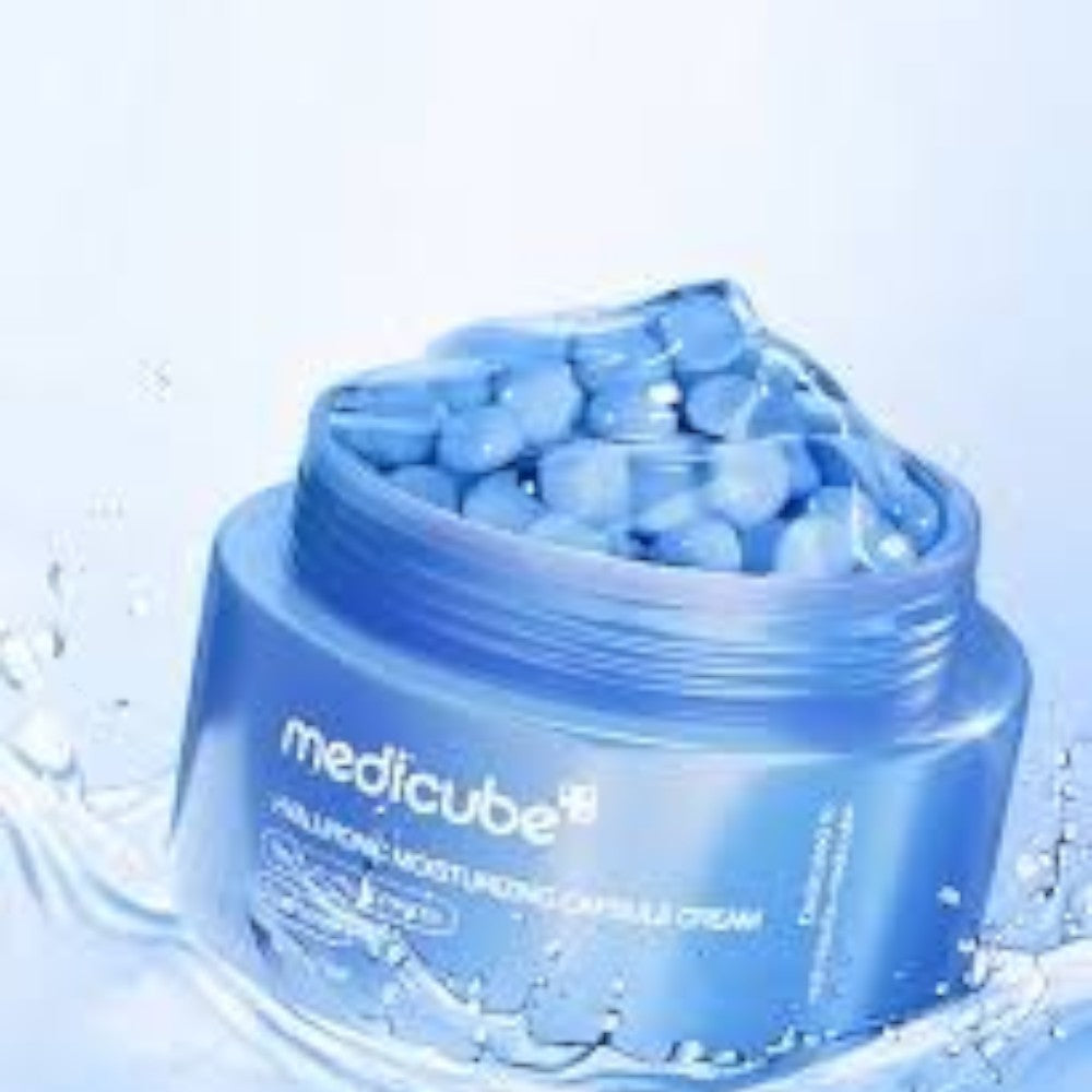 Skin TOGO Medicube Hyaluronic Moisturizing Capsule Cream in a blue jar with visible hydrating gel capsules
