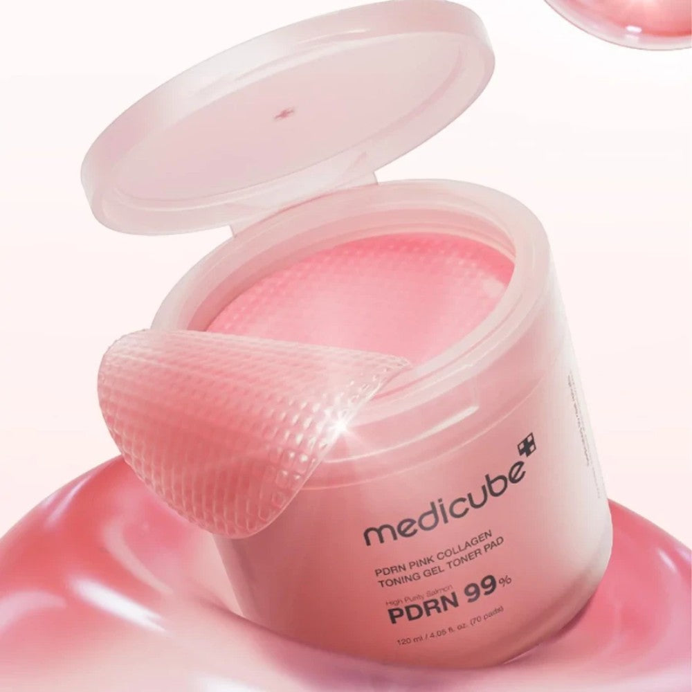 Skin TOGO Medicube PDRN Pink Collagen Toning Gel Toner Pads in a pink jar with a textured gel pad on top.