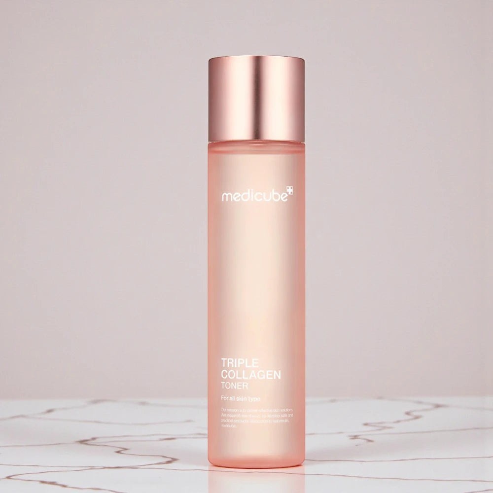 Skin TOGO Medicube Triple Collagen Toner in a pink bottle with a metallic cap for skin elasticity and hydration