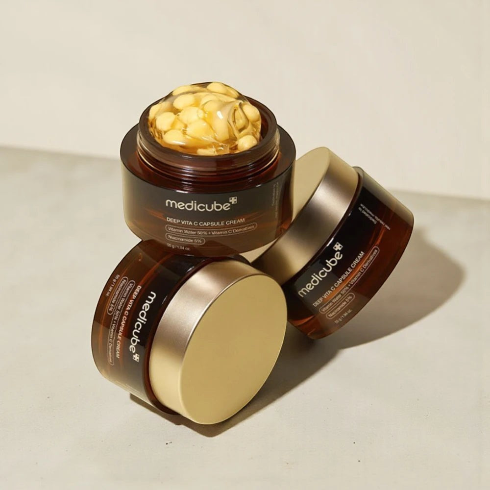 Skin TOGO Medicube Deep Vitamin C Capsule Cream jars with visible yellow vitamin capsules in a clear gel formula.