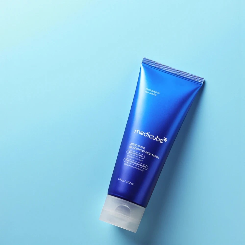 Skin TOGO Medicube Zero Pore Blackhead Mud Mask in a blue squeeze tube for deep pore cleansing and oil control.
