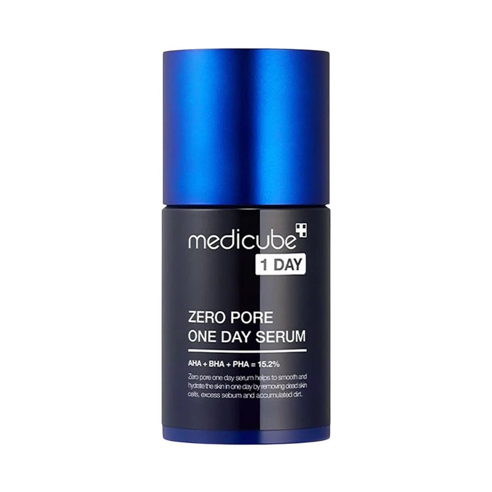 Skin TOGO Medicube Zero Pore One-day Serum in a dark blue bottle with a metallic blue cap for pore refinement.