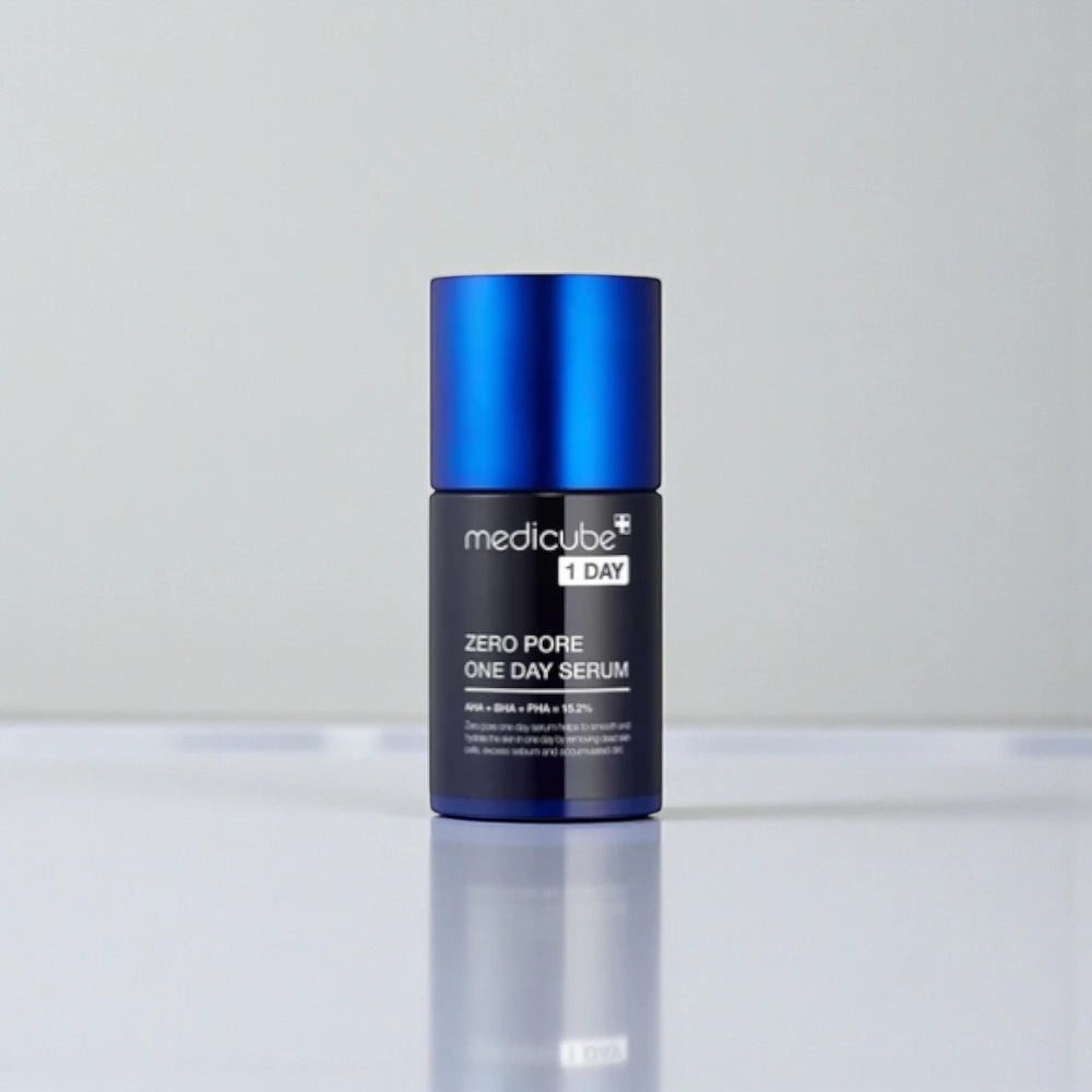 Skin TOGO Medicube Zero Pore One-day Serum in a blue bottle for exfoliating and refining pores.