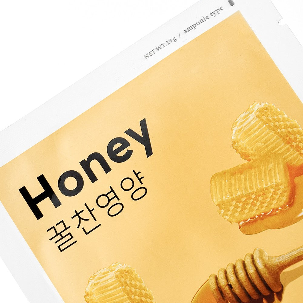Skin TOGO Missha Airy Fit Honey sheet mask packaging with honeycomb and honey dipper illustrations