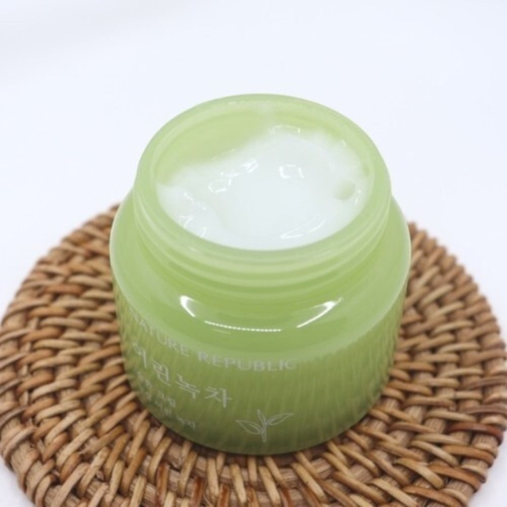 Skin TOGO NATURE REPUBLIC Young Green Tea Mild Cream in a light green jar with white gel-cream texture on a rattan mat