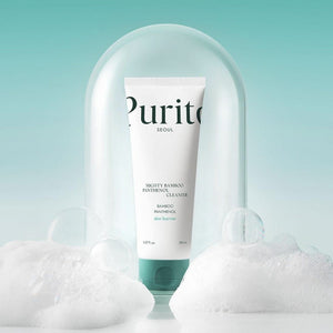 Skin TOGO Purito Mighty Bamboo Panthenol Cleanser tube surrounded by soap bubbles under a glass dome