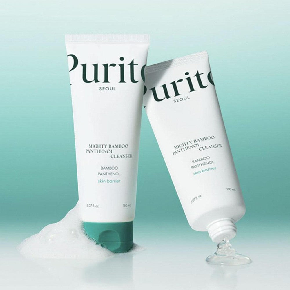 Skin TOGO Purito Mighty Bamboo Panthenol Cleanser tubes with foaming texture on a soft teal background.