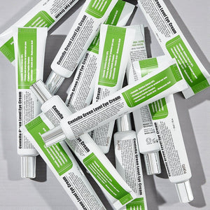Skin TOGO Purito Centella Green Level eye cream tubes arranged in a flat lay pattern on a light grey background.