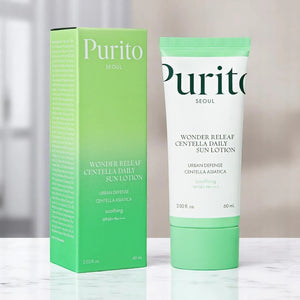 Skin TOGO Purito Wonder Releaf Centella Daily Sun Cream in a light green tube and matching box, 60ml SPF50+ sunscreen.