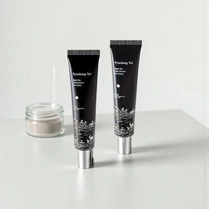Skin TOGO Pyunkang Yul Black Tea Time Reverse Eye Cream tubes with elegant black packaging and silver caps
