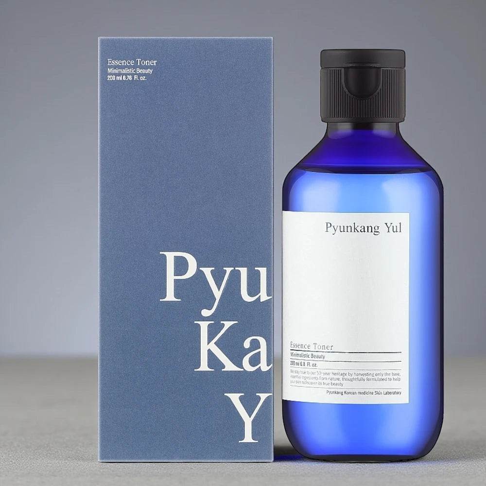 Skin TOGO Pyunkang Yul Essence Toner 200ml bottle and its blue minimalist packaging box on a grey surface.