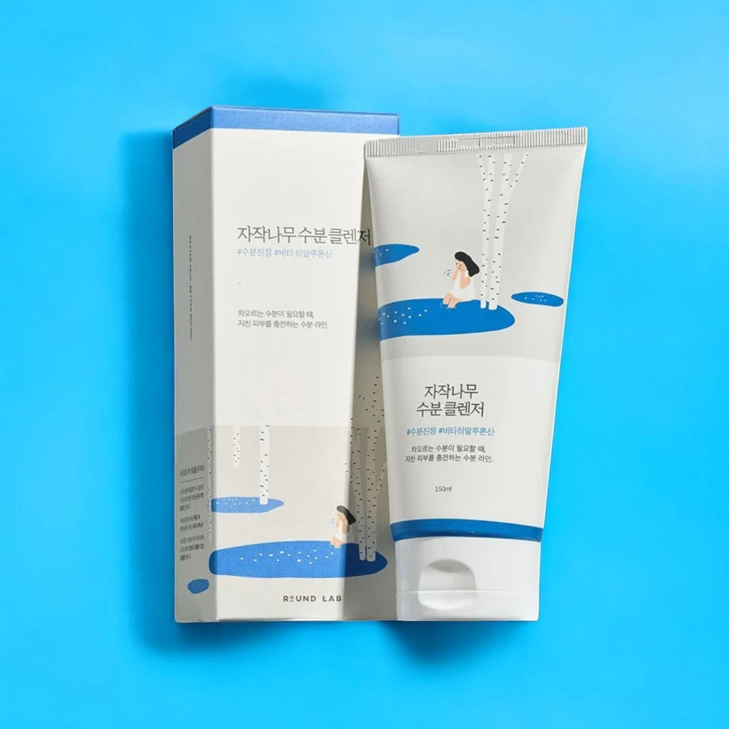 Skin TOGO Round Lab Birch Juice Moisturizing Cleanser tube and box with blue and white birch tree design
