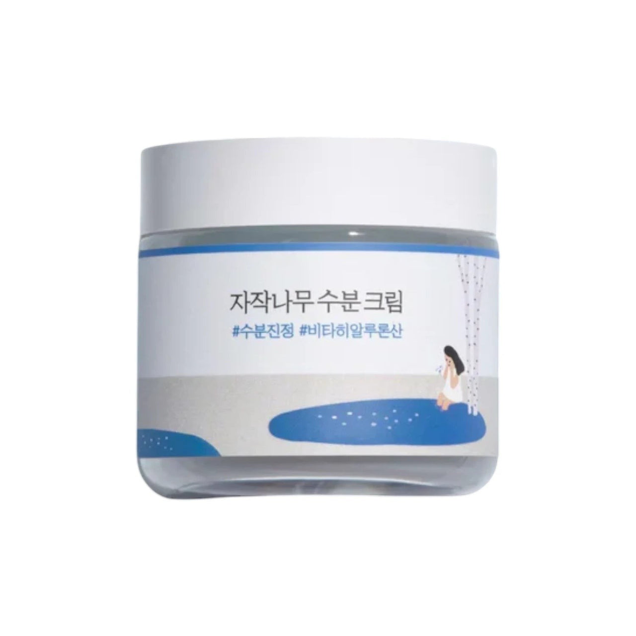 Skin TOGO Round Lab Birch Juice Moisturizing Cream in a white jar with a minimalist birch tree illustration.