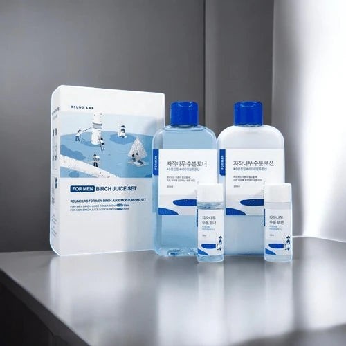 Skin TOGO Round Lab Birch Juice moisturizing skincare set for men with toner, lotion, and travel-sized bottles.