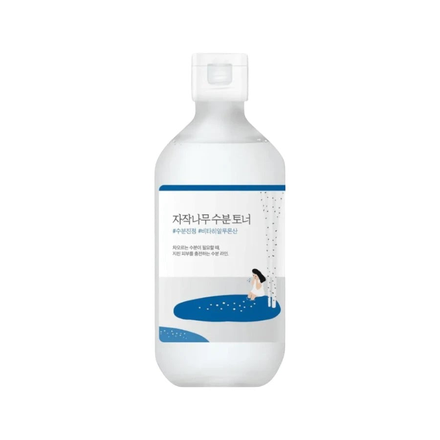 Skin TOGO Round Lab Birch Juice Moisturizing Toner in a 300ml clear bottle with a white cap and illustrated label.