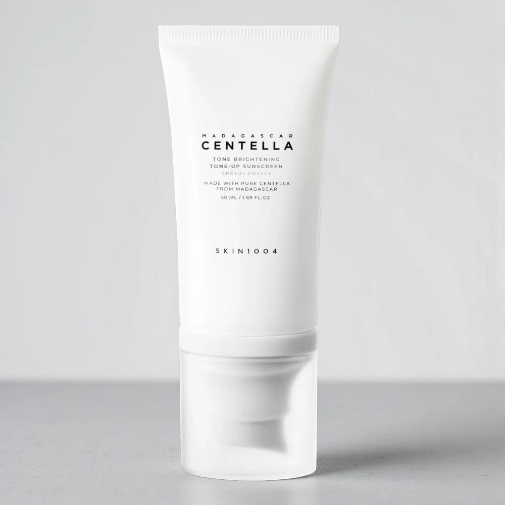 Skin TOGO SKIN1004 Madagascar Centella Tone Brightening Tone-Up Sunscreen SPF50+ in a white 50ml tube.
