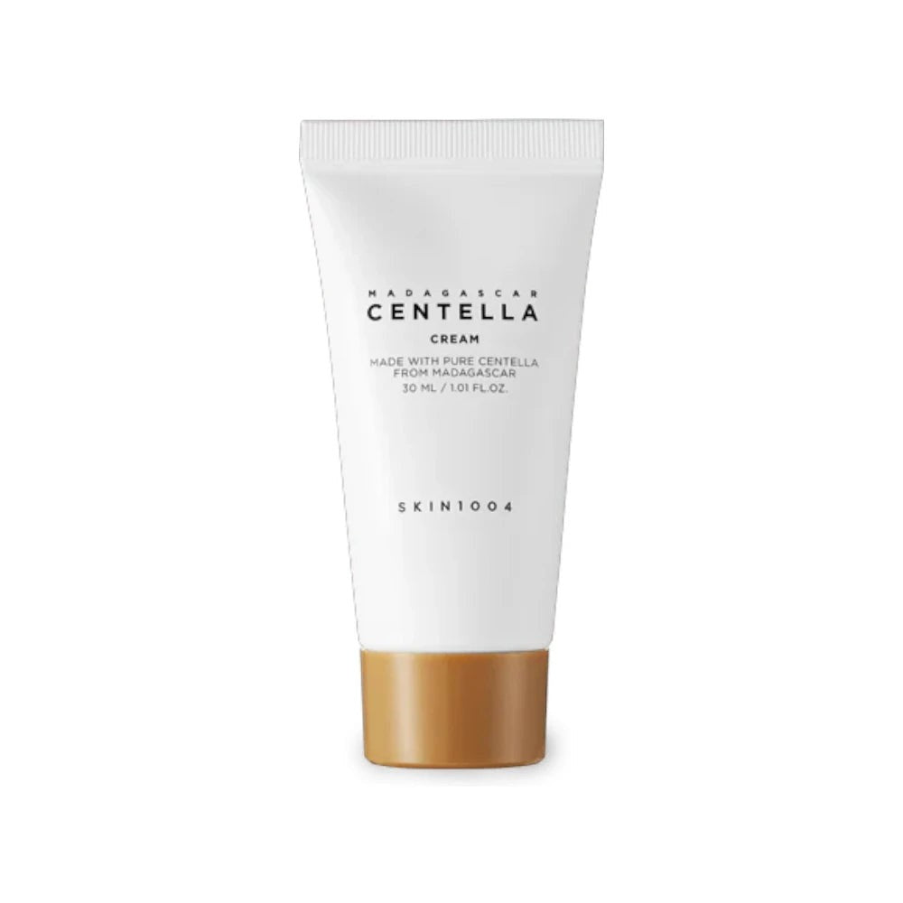 Skin TOGO SKIN1004 Madagascar Centella Cream in a 30ml white tube with a gold cap for soothing and hydrating skin.