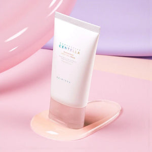 Skin TOGO SKIN1004 Poremizing Light Gel Cream in a white tube on a pink and purple pastel background.