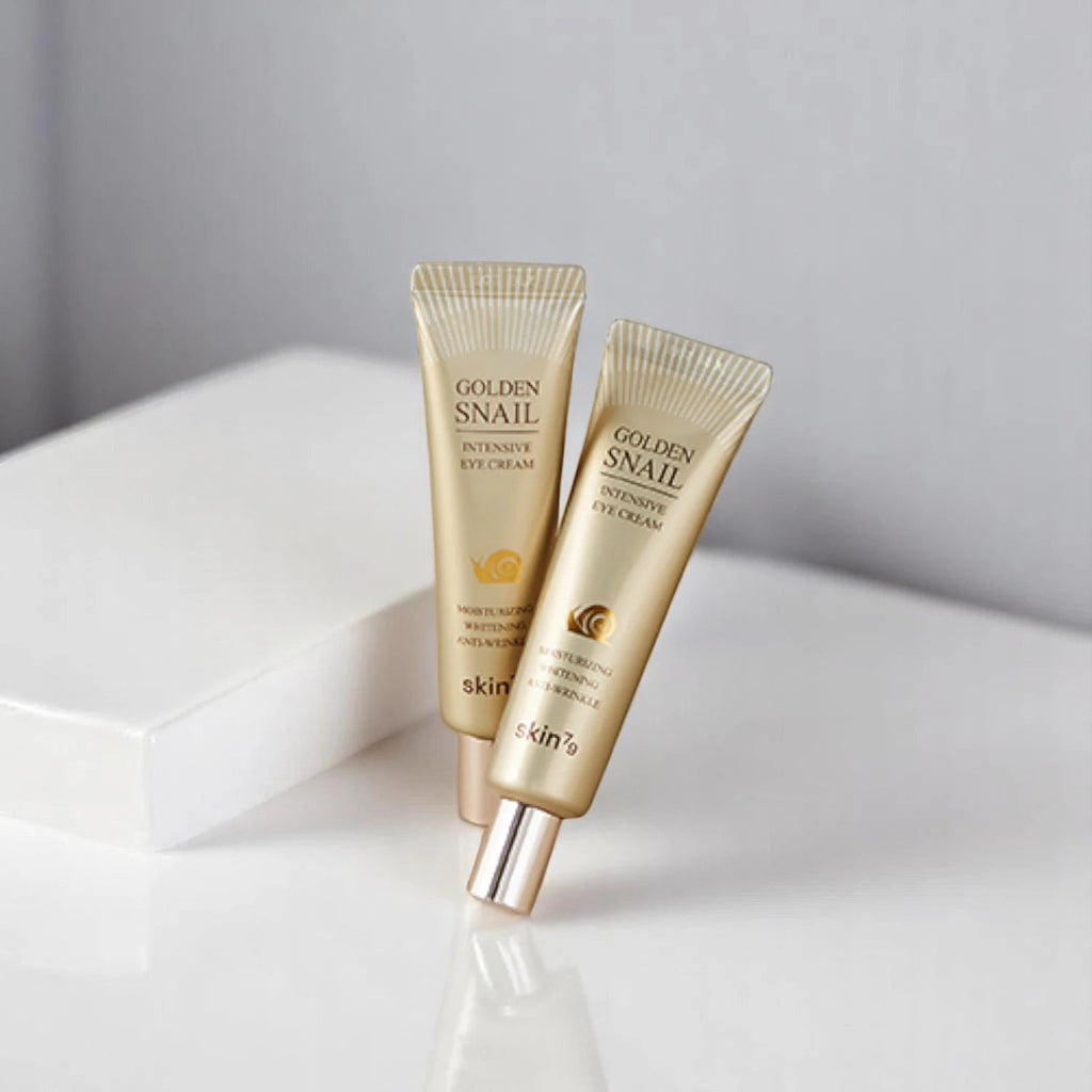 Skin TOGO Skin79 Golden Snail Intensive Eye Cream in gold tubes for anti-aging and moisturizing eye care.