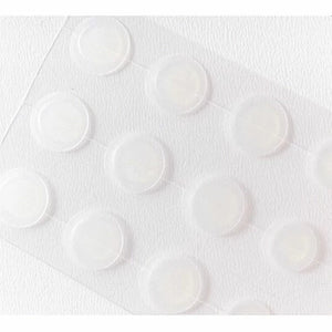 Skin TOGO Some By Mi Miracle Clear Spot Patch hydrocolloid acne stickers on a transparent sheet for skin care