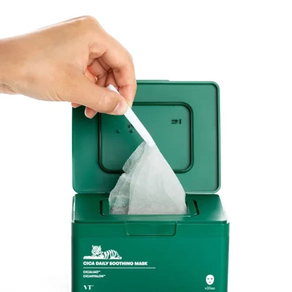 Skin TOGO VT CICA Daily Soothing Mask box with 30 sheets being lifted by tweezers for sensitive skin care