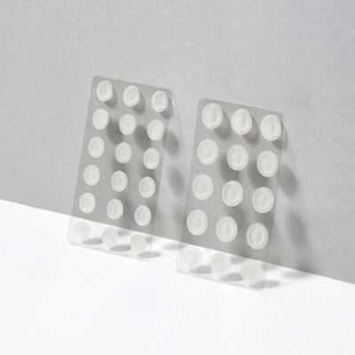 Skin TOGO VT Cosmetics Cica Reti-A hydrocolloid acne patches in two sizes on clear sheets for targeted spot treatment.