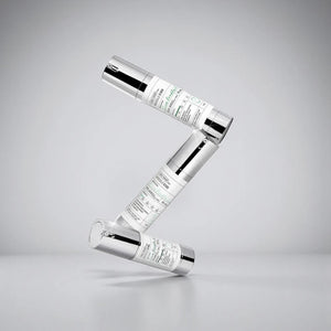 Skin TOGO VT Cosmetics Reedle Shot 100 essence bottles stacked in a Z-shape against a neutral studio background.